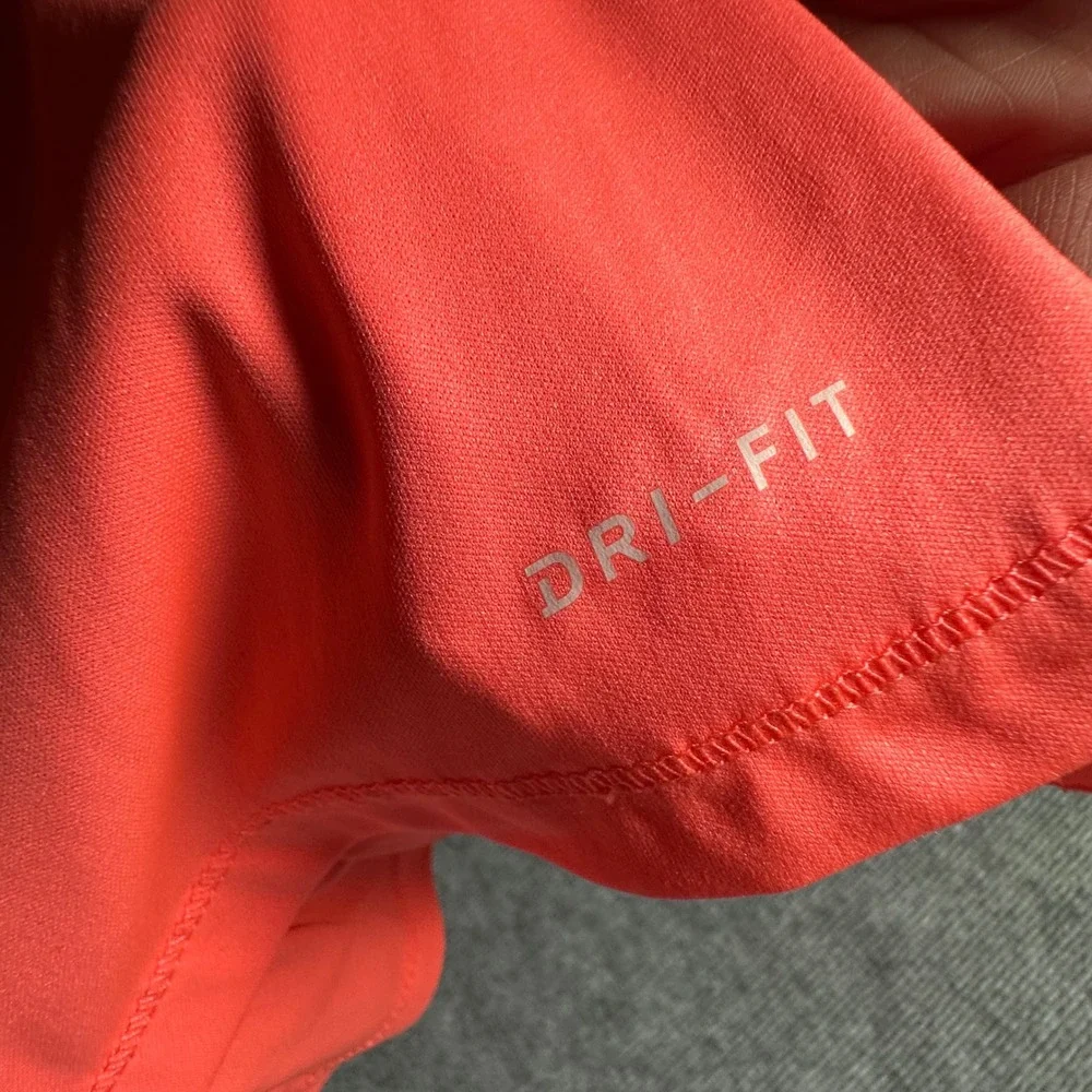 Nike Kids Dri-FIT Long Sleeve Peplum Ruffle Top Coral Pink Iridescent Swoosh